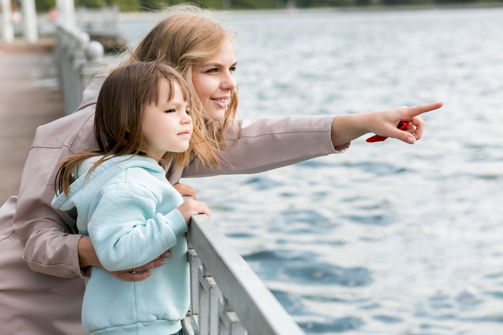 child-mother-by-seaside